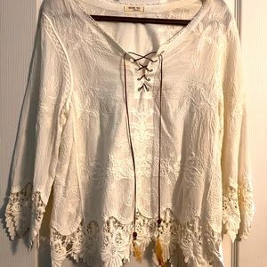 Gorgeous blouse with feather detail